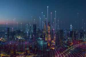 City skyline with glowing digital data lines-endpoint security