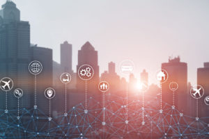A modern city skyline at sunrise with a digital network overlay-msps near me