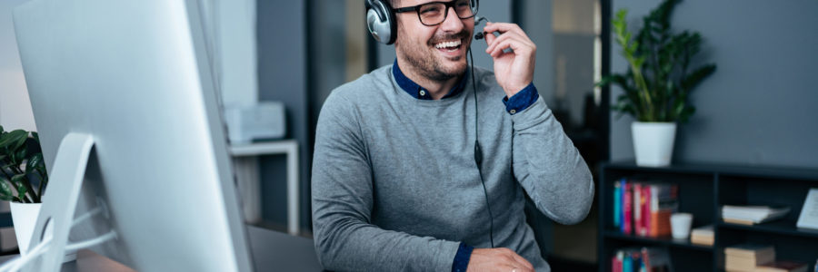 Happy tech support operator in headset - tech support specialist
