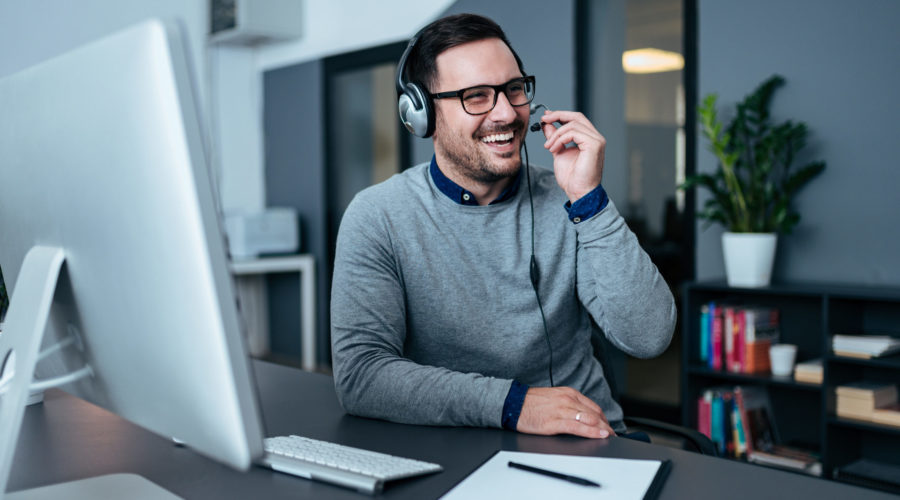 Happy tech support operator in headset - tech support specialist