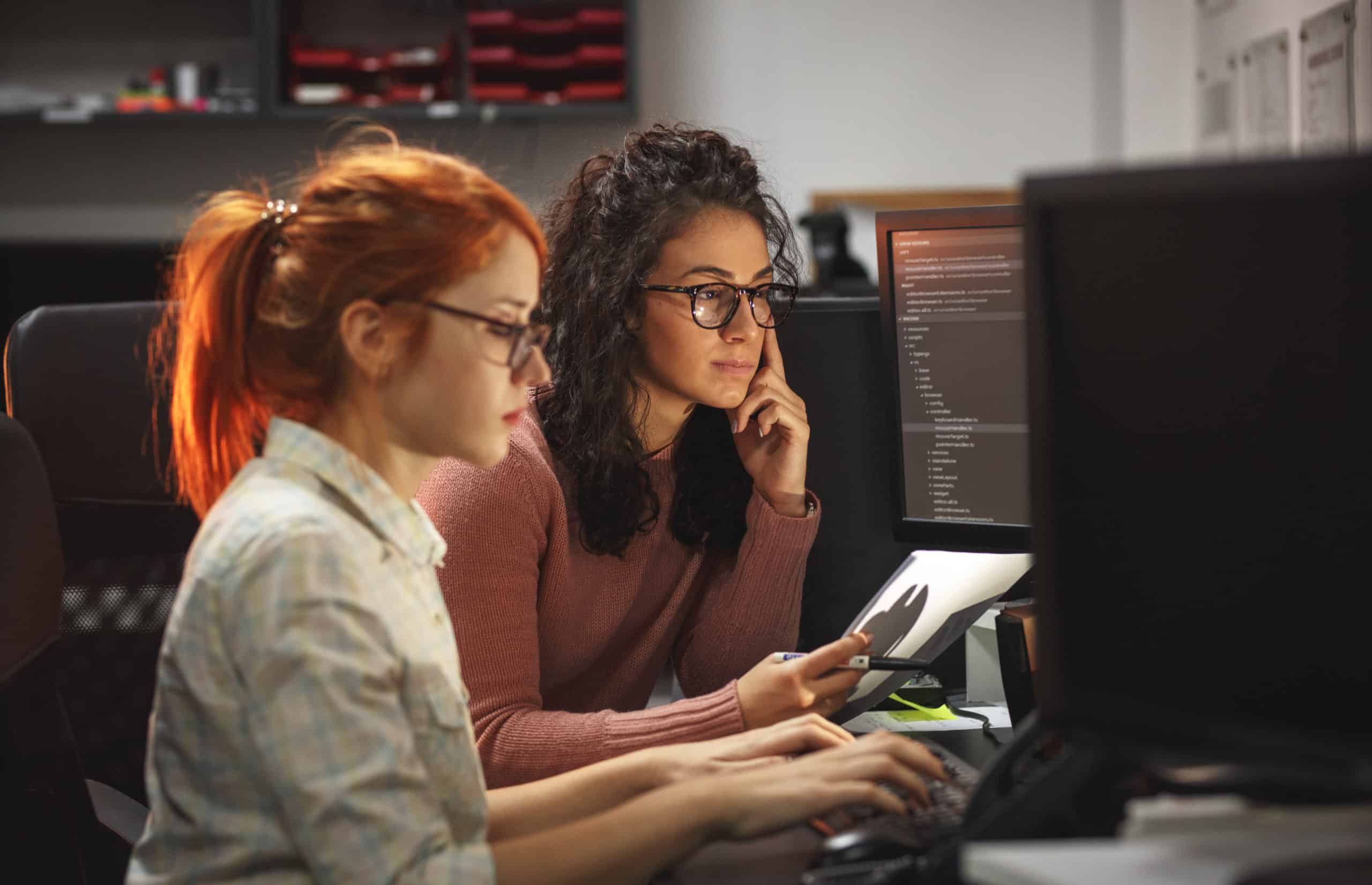 two girls working