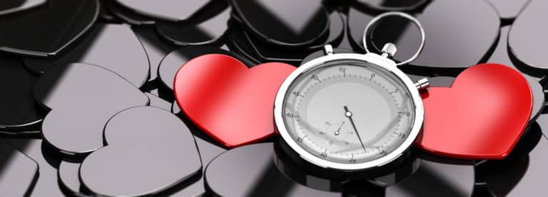 Two red hearts between time